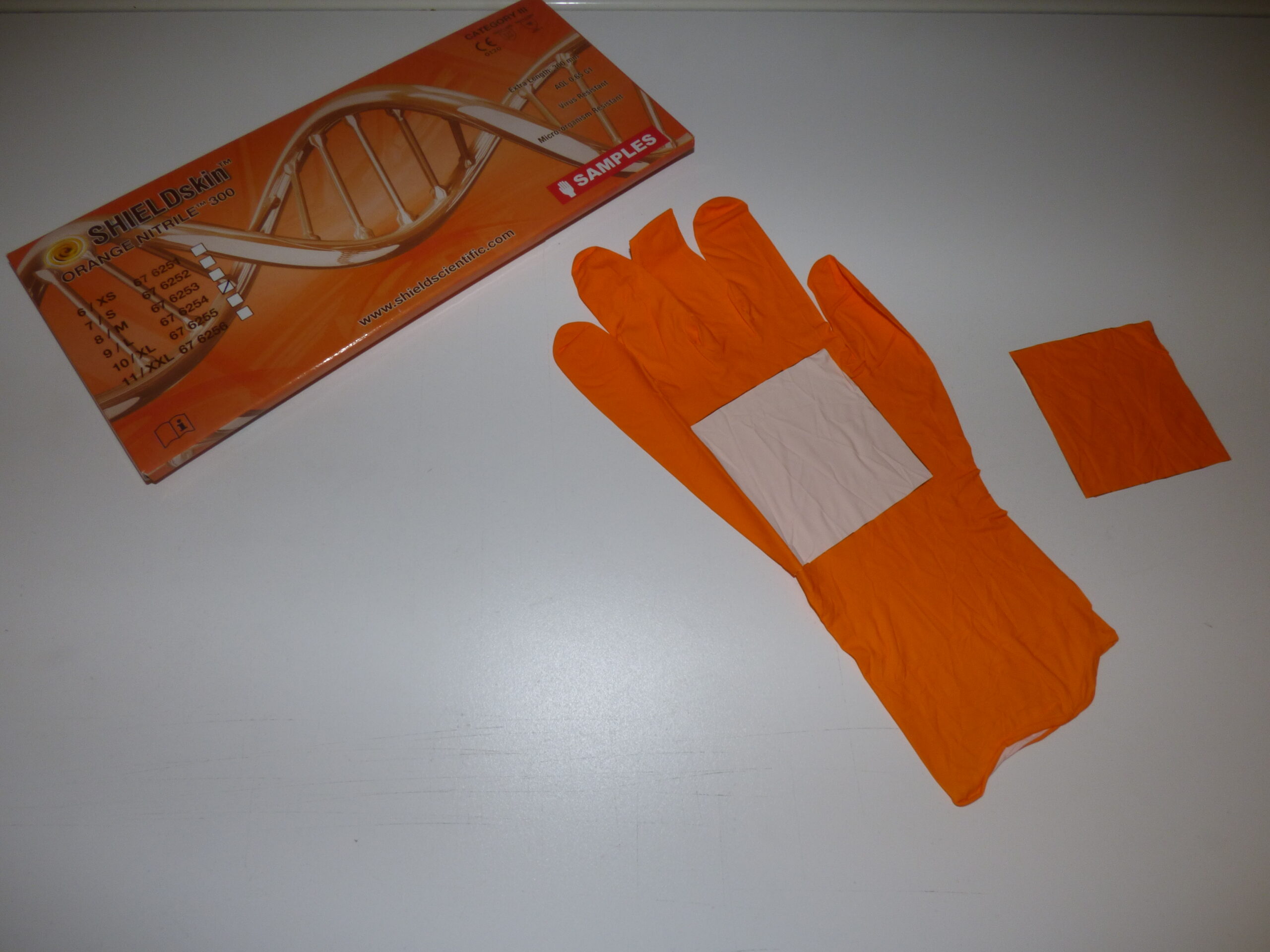SHIELD Scientific single-use glove sampling with dispenser